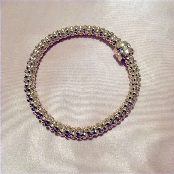 Gold-colored stretchy bracelet - Picture 2 of 2